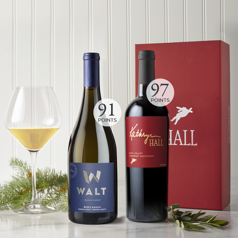Image of HALL Family wines Heritage Gift Set including the 2019 HALL Kathryn Hall Cabernet Sauvignon and 2020 WALT Bob's Ranch Chardonnay with a red gift box. 