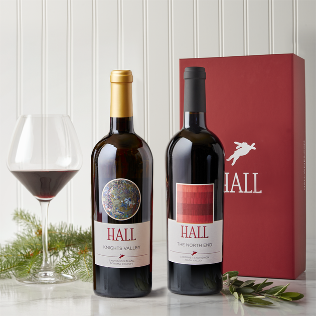 Image of 2021 Knights Valley Sauvignon Blanc and 2019 North End Cabernet Sauvignon with a red gift box. 